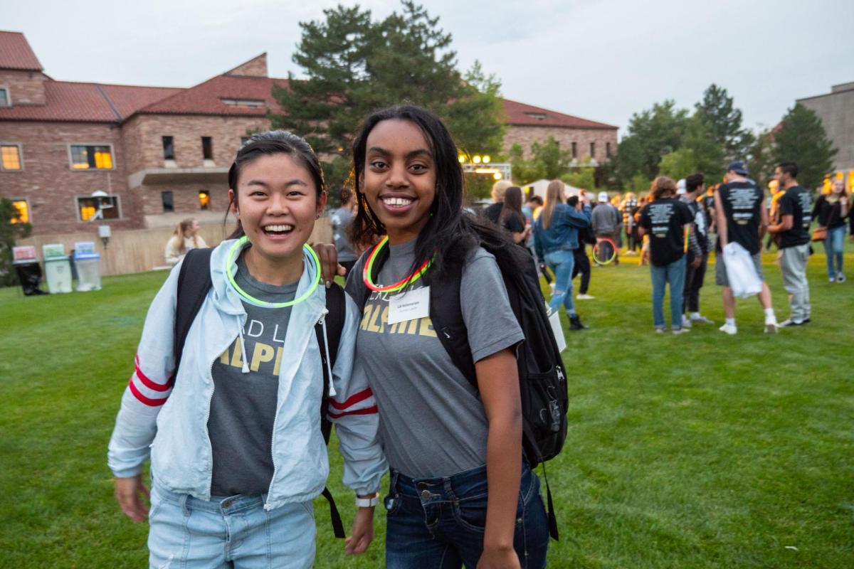 Two students at campus social event