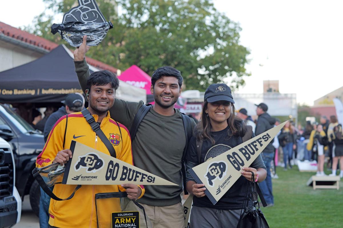 Fans wave CU flags at game